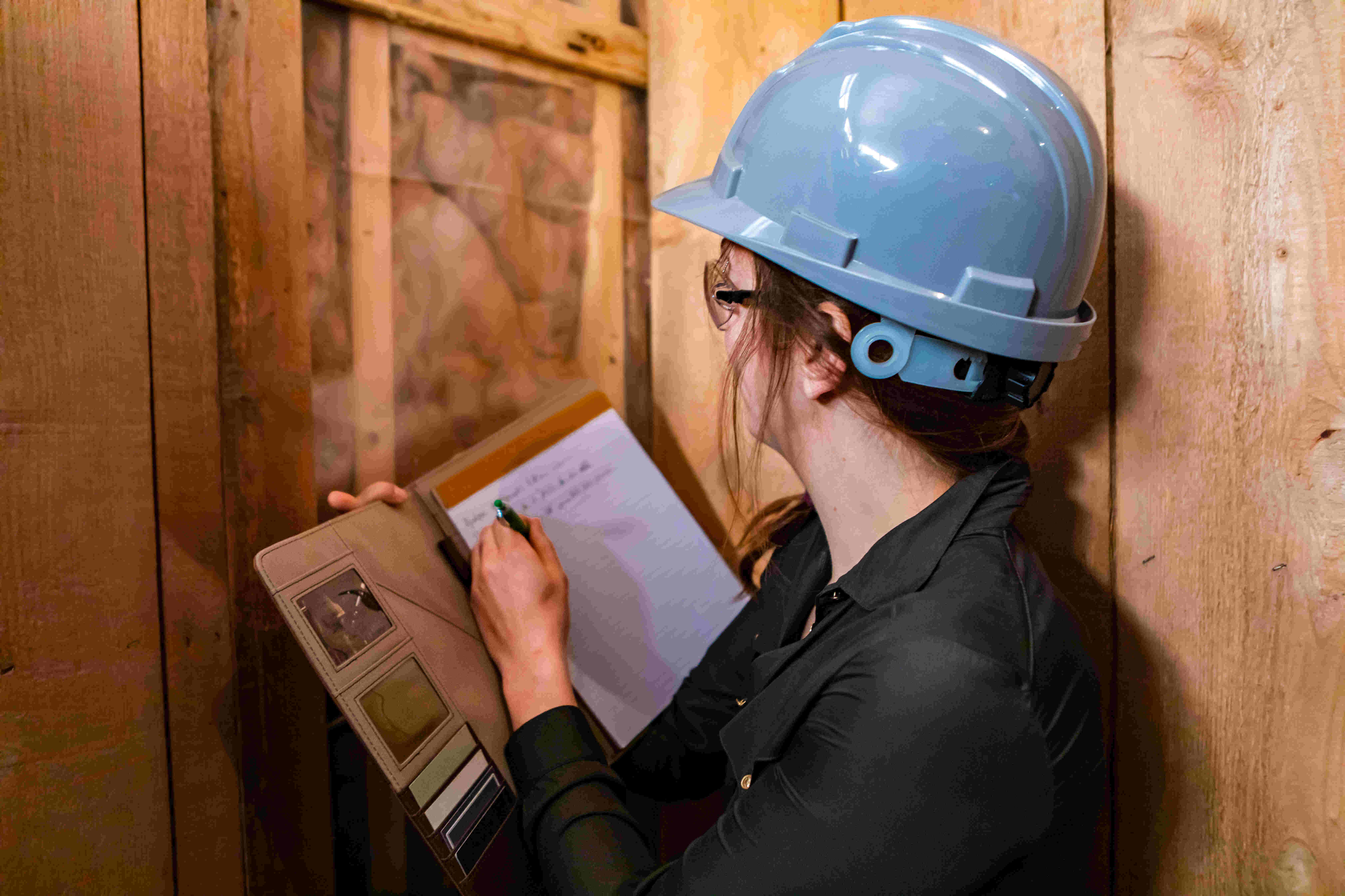 woman with clipboard doing an inspection